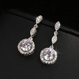 Boucles d'oreilles vintage en argent avec cristaux ronds étincelants et motif feuille