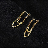 Boucles d'oreilles pendantes vintage en chaîne dorée