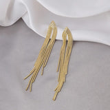 Boucles d'oreilles délicates à franges et pampilles en chaîne dorée