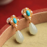 Boucles d'oreilles vintage classiques avec perles turquoise