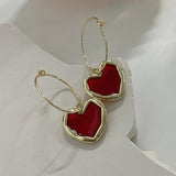 Boucles d'oreilles pendantes cercle cœur rouge doré