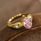 Bague ovale rose avec pierre précieuse et anneau en or