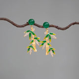 Boucles d'oreilles vintage en or et jade vert avec feuilles de bambou