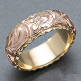 Bague vintage en or rose gravée d'une fleur