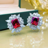 Boucles d'oreilles florales en argent et pierres rouges