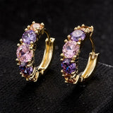Boucles d'oreilles vintage en or avec pierre violette