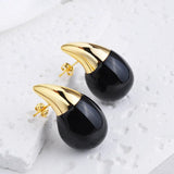 Boucles d'oreilles pendantes pointues en or noir