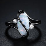 Bague vintage noire et opale torsadée