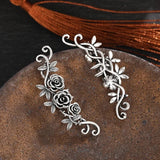 Boucles d'oreilles vintage en argent à motif floral