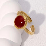 Bague ajustable vintage en or et pierres rouges