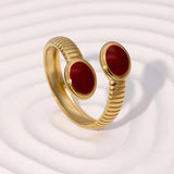 Bague vintage en or ajustable avec deux pierres rouges