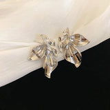 Boucles d'oreilles vintage en argent en forme de feuilles incurvées