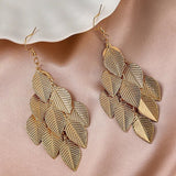 Boucles d'oreilles pendantes multiples en forme de feuilles d'or