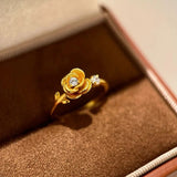 Bague vintage en or ajustable avec motif floral et diamants