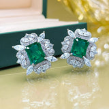 Boucles d'oreilles vintage en argent avec pierres précieuses vertes