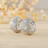 Boucles d'oreilles courbées en argent scintillantes