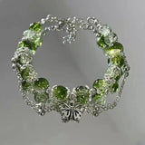 Bracelet vintage argent papillon et perles vertes