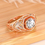 Bague vintage en or rose avec diamant et feuille