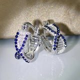 Boucles d'oreilles créoles en argent et cristal bleu