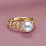 Bague vintage ajustable en or et perles avec motif floral