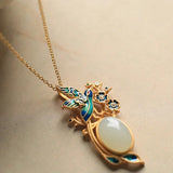 Collier classique avec pendentif ovale en or, oiseau et fleurs