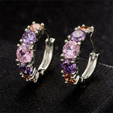 Boucles d'oreilles vintage en argent avec pierres violettes