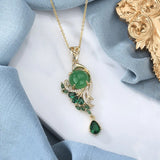 Collier classique en or et cristal vert vent Phoenix