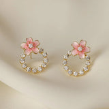 Boucles d'oreilles clous fleur rose en or