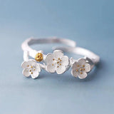 Bague vintage ajustable en argent avec motif floral