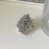 Bague ajustable unique en argent avec grappe sertie de boules