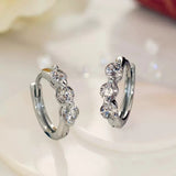 Boucles d'oreilles créoles rondes en argent avec pierre
