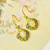 Boucles d'oreilles pendantes vintage en or et vert avec fleurs et pierres précieuses blanches
