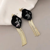 Boucles d'oreilles pendantes vintage en bambou noir et or avec pompons