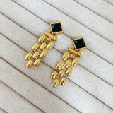 Boucles d'oreilles vintage en or avec longues pampilles et cristaux noirs