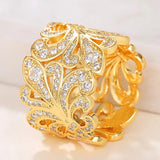 Bague vintage en or avec motif floral et cristaux