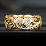 Bague vintage en or avec motif floral tourbillonnant