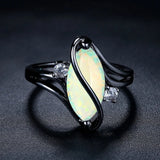 Bague vintage en argent noir avec opale et cristaux