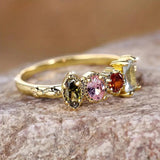 Bague vintage en or avec quatre pierres en zircone