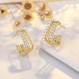 Boucles d'oreilles créoles vintage en or incrustées de perles et de pierres précieuses