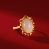 Bague ajustable classique en or ovale avec pierre précieuse blanche et motif floral