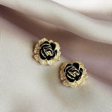 Boucles d'oreilles vintage en or et rose noire