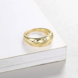 Bague étoile dorée et cristaux étincelants
