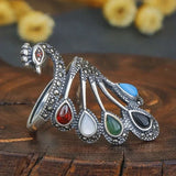 Bague ethnique en argent avec pierres précieuses multicolores et magnifique paon