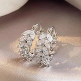 Boucles d'oreilles créoles en argent marquise feuille