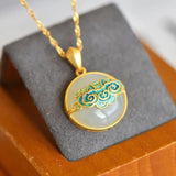 Collier pendentif vintage en or et nuage tourbillonnant
