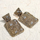 Boucles d'oreilles vintage en argent et or avec cristaux