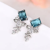 Boucles d'oreilles rectangulaires en argent avec pierre bleue