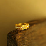 Bague vintage ajustable en or avec bande rehaussée de perles