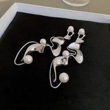 Boucles d'oreilles vintage en argent abstrait et perles