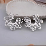 Boucles d'oreilles fleurs feuilles creuses en argent